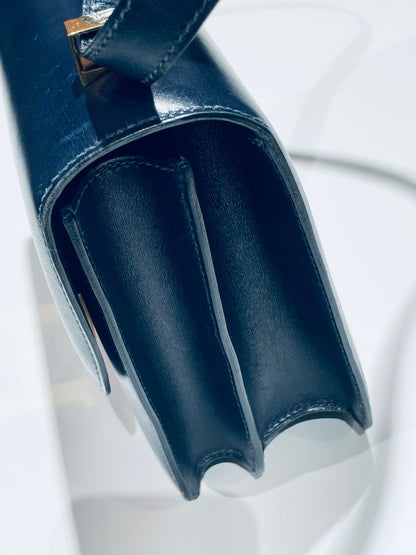 Hermès Constance Schultertasche in navy und Gold