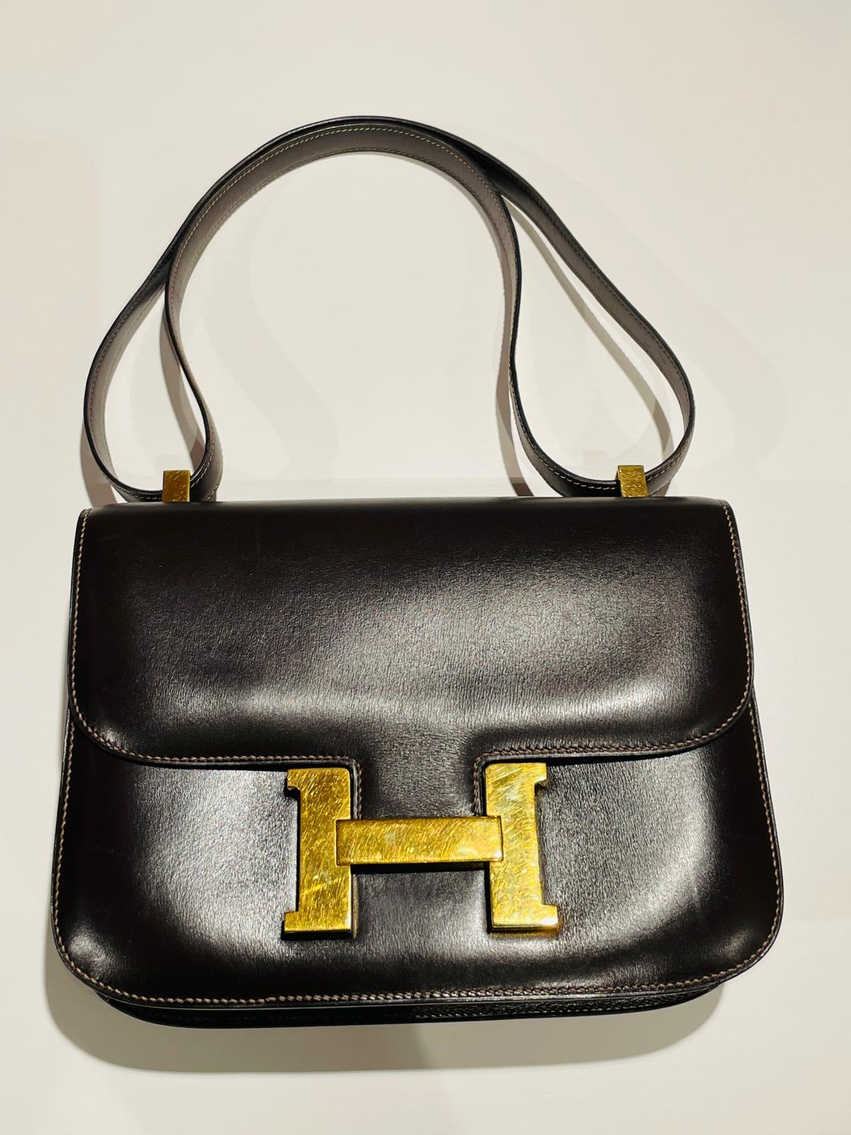 Hermès Constance Schultertasche in braun und Gold