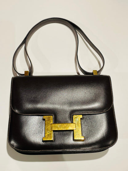 Hermès Constance Schultertasche in braun und Gold