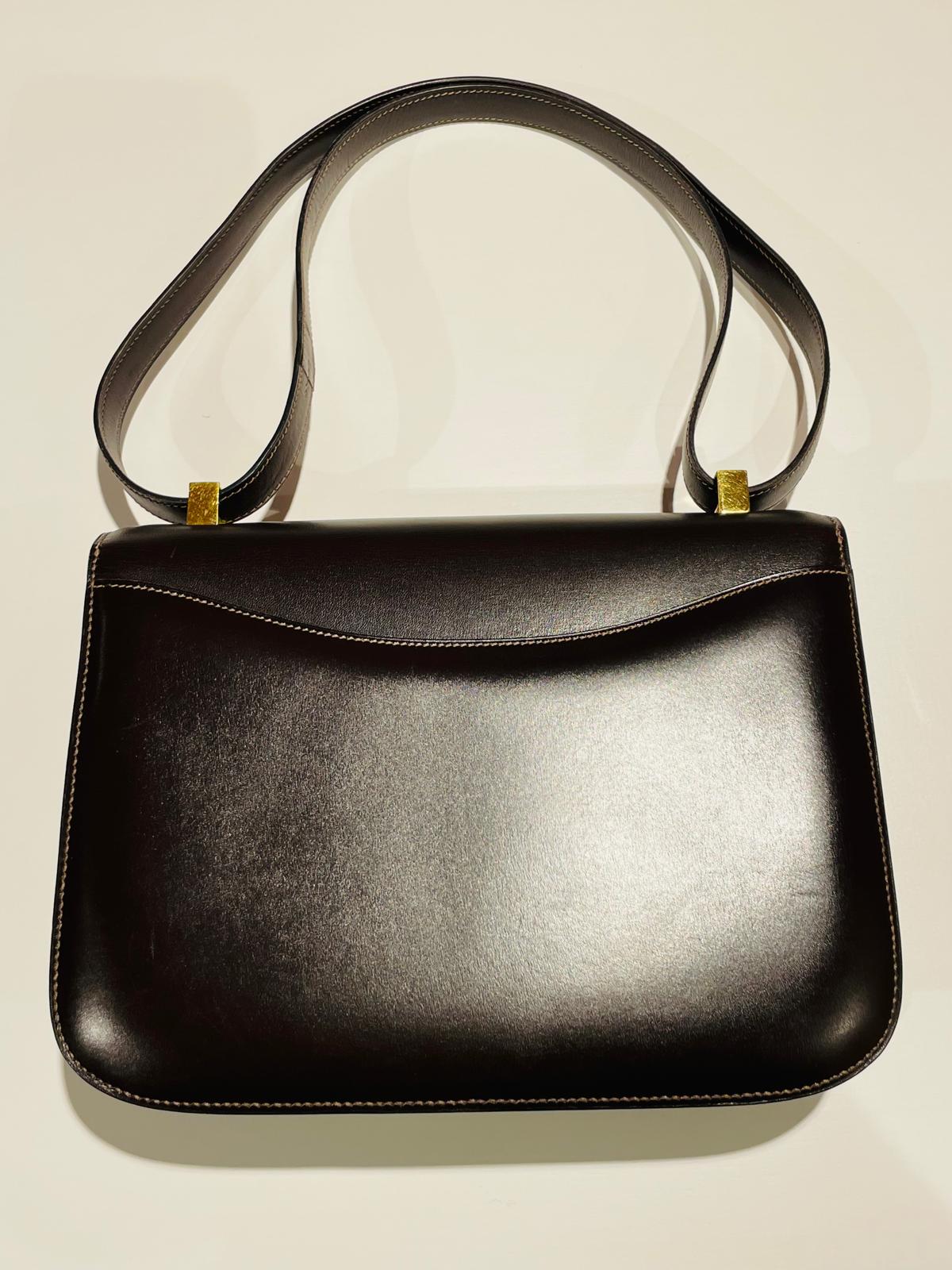 Hermès Constance Schultertasche in braun und Gold