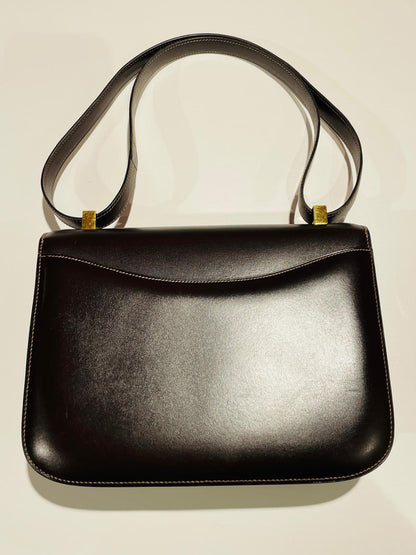Hermès Constance Schultertasche in braun und Gold